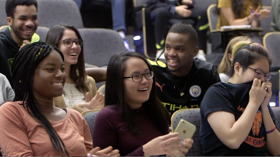 Students laugh and cheer as 2.001 Lecturer Simona Socrate demonstrates the transition from rubber to glassy modulus by shattering a squash ball hardened by a bath in liquid nitrogen. Back row: Christian Belser; center row (left to right): Mariana Avila and Mojolaoluwa Oke; front row (left to right): Stacy Godfreey-Igwe, Mai Nguyen, and Jenny Zhang. 