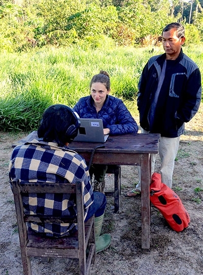 Graduate student and lead author Malinda McPherson works with a participant and translator in the field.