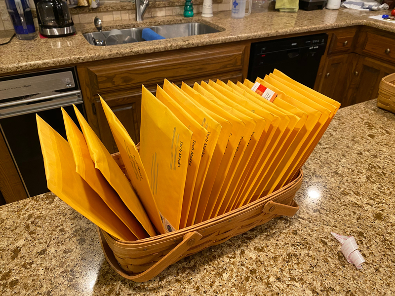 Photo of a tray of manilla envelopes