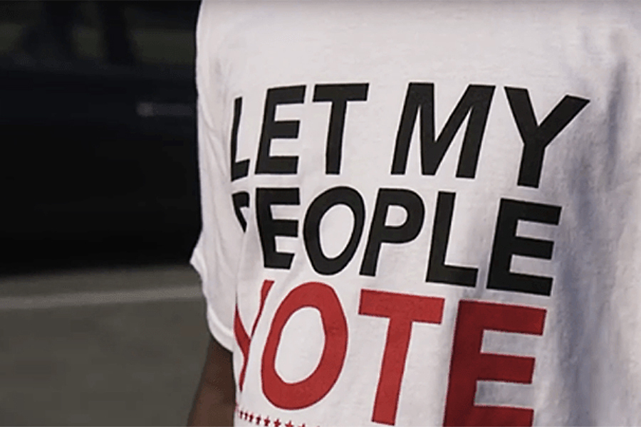 Photo of t-shirt with the text: Let My People Vote 