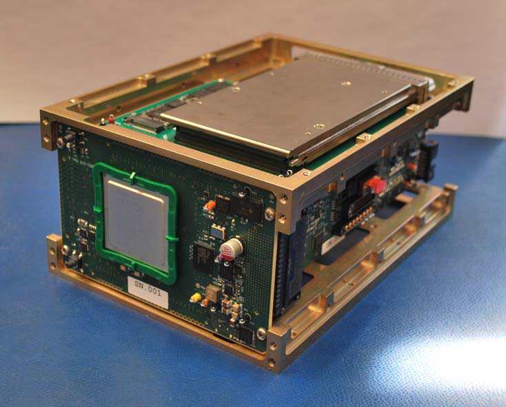 Photo of a CubeSat box festooned with electronics