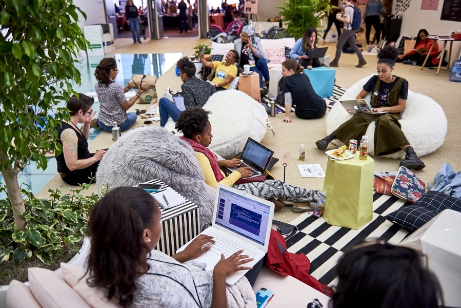 Photo of women at an MIT hackathon