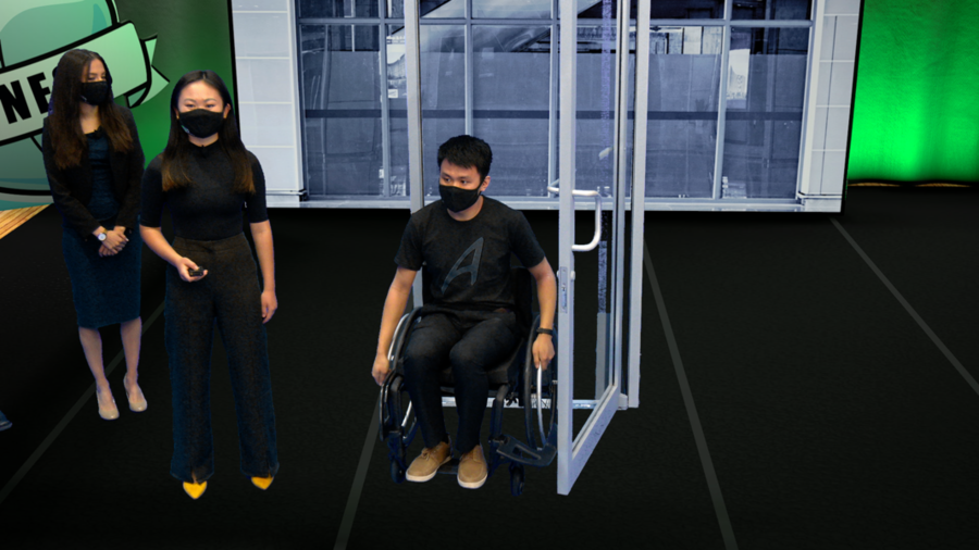 Photo of a person in a wheelchair traveling through an open door