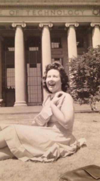 Sepia-colored photo of Ruth Anderson as a young woman, sitting on Killian Court