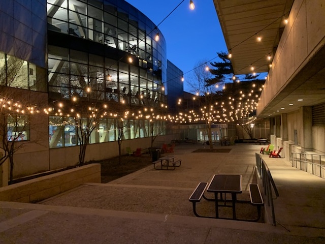 Bistro lights between the Student Center and Zesiger Center