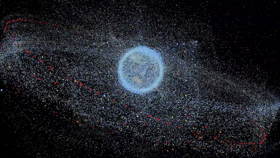 Image of Earth surrounded by millions of dots representing orbiting particles of space debris