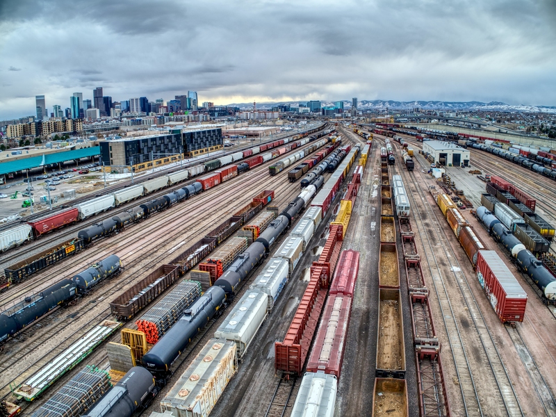 Photo of a busy rail yard with scores of tracks and dozens of trains