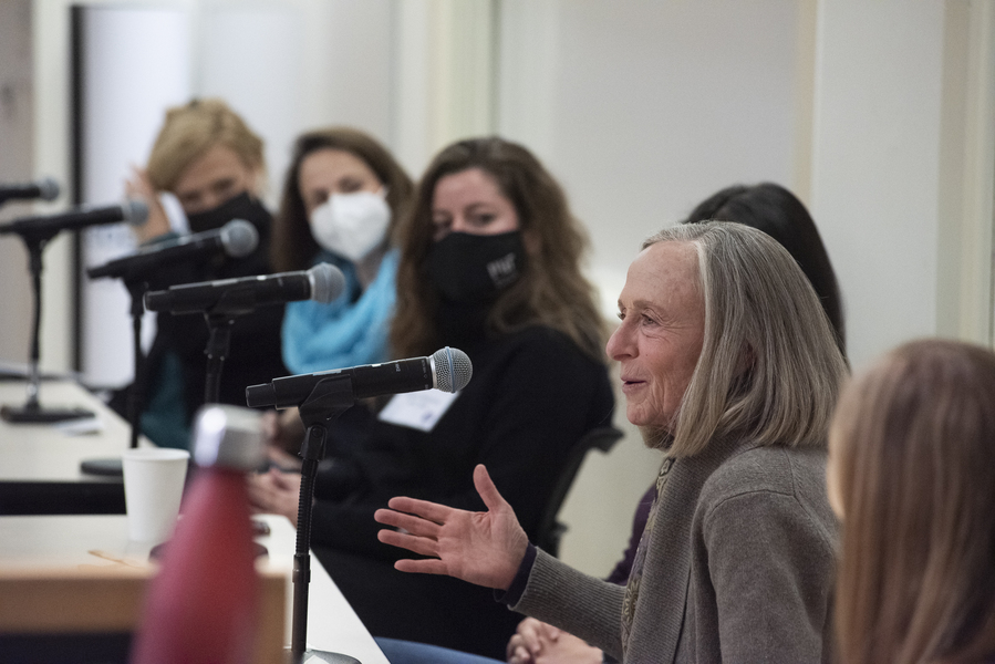 Photo of a panel of women turning their attention to Susan Hockfield, who is speaking.