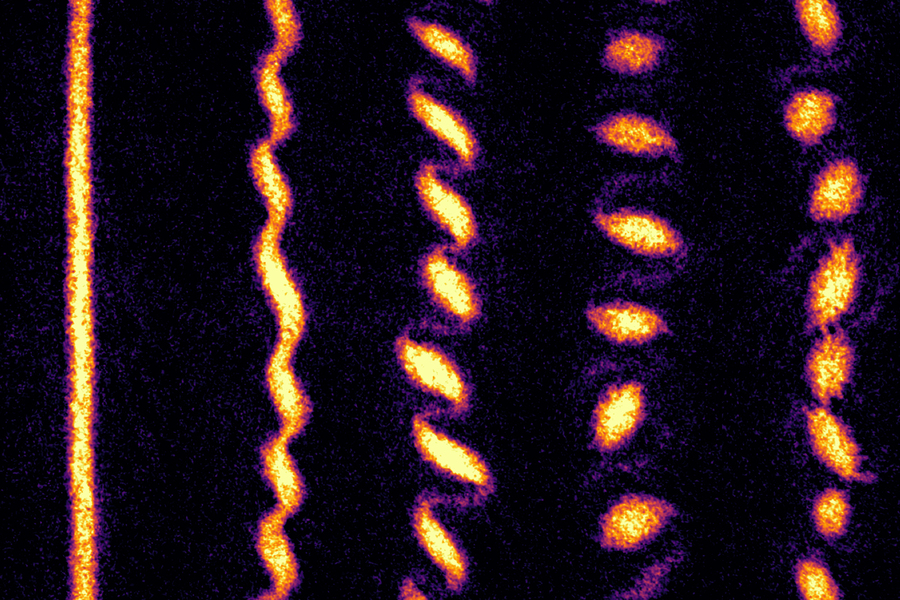 Physicists watch as ultracold atoms form a crystal of quantum tornadoes