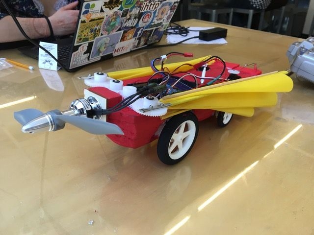 Photo of a model flying car on a tabletop