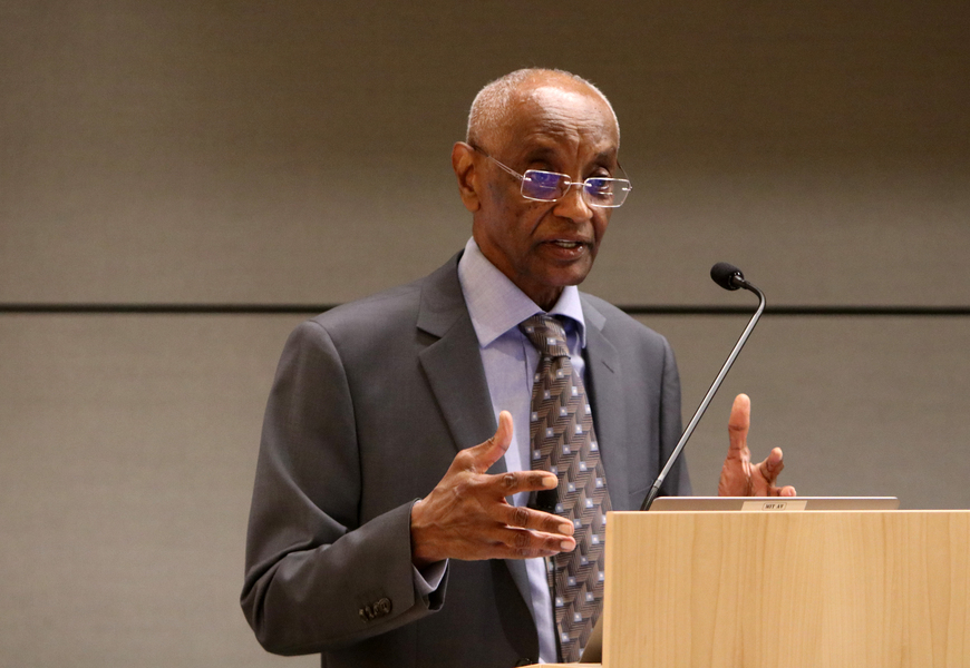 Photo of Mohamed H.A. Hassan speaking at a podium