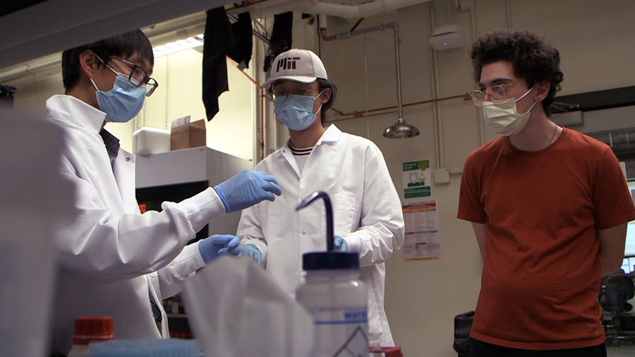 Photo of Ming Guo, Haiqian Yang, and Joseph Bonavia in the lab
