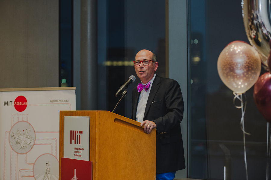 Joseph Coughlin speaking at podium