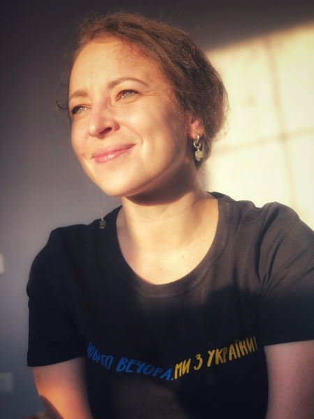 Headshot of Tetiana Herasymova smiling in the sunshine