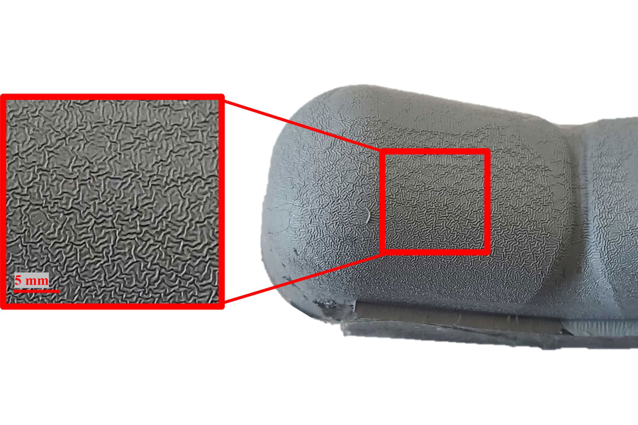 Two closeup views of a robotic finger’s unique contours, almost like the wrinkles or ridges of a fingerprint. 
