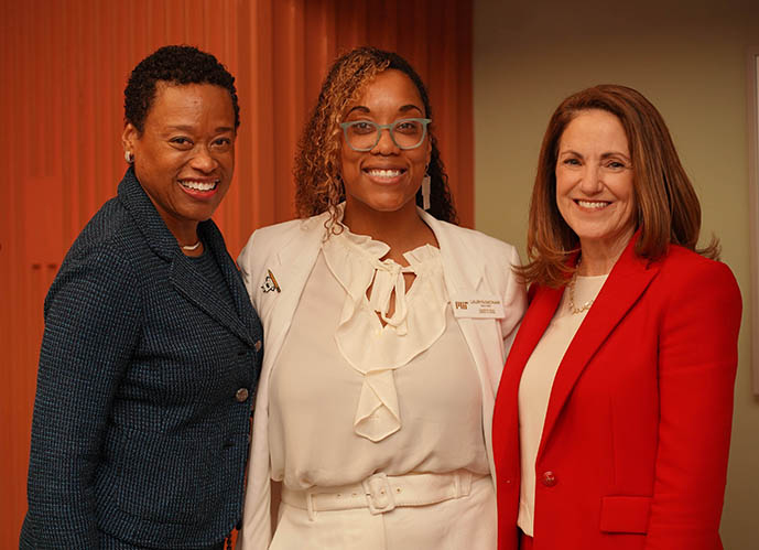 Melissa Nobles, Lauryn McNair, and Cynthia Barnhart pose for a photo in MIT's Margaret Cheney Room