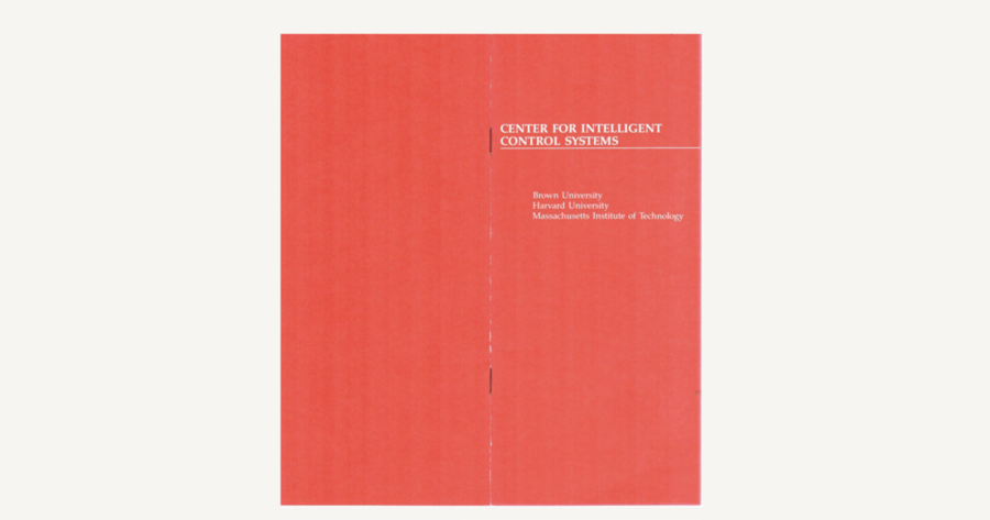 A battered, bright-red booklet lies against a cream-colored table.