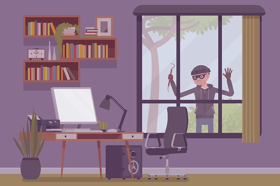 A cartoon depicts a burglar with a crowbar looking through the window of a home office where a computer sits atop a desk under bookshelves
