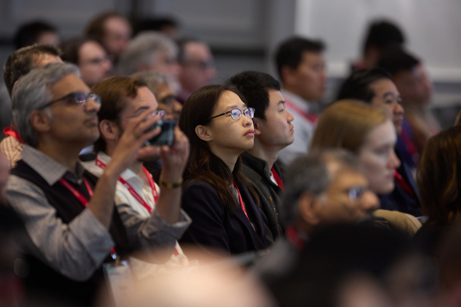 Close-up of an audience seated in an auditorium