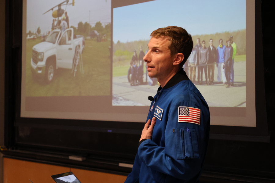 A NASA astronaut seen in profile shares a presentation of his journey from MIT to the ISS.