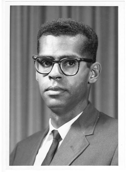 Black and white headshot of a young Willard Johnson