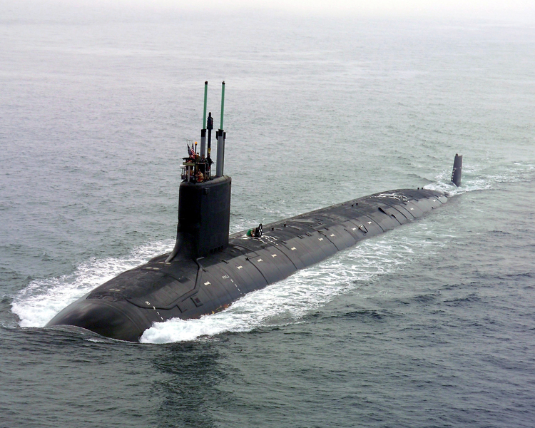 Photo of the USS Virgina submarine underway partially submerged.