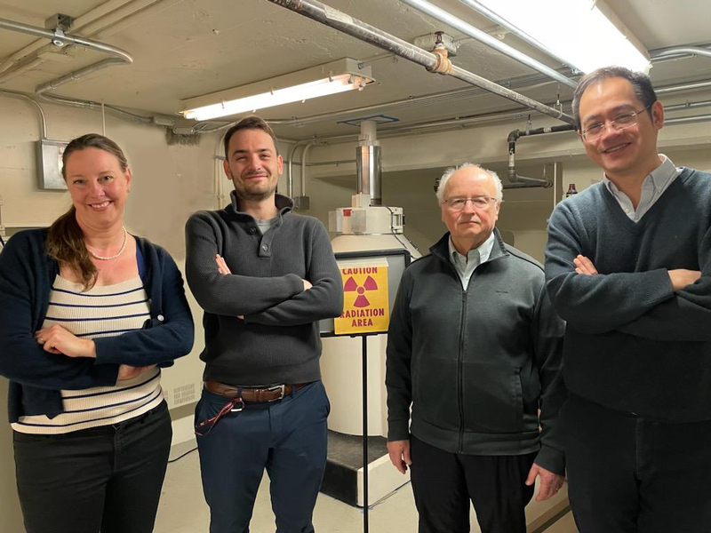 hyperloop technology research paper Jennifer Rupp, Thomas Defferriere, Harry Tuller, and Ju Li pose standing in a lab, with a nuclear radiation warning sign in the background