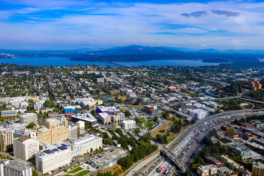 Aerial view of busy Seattle and bay.