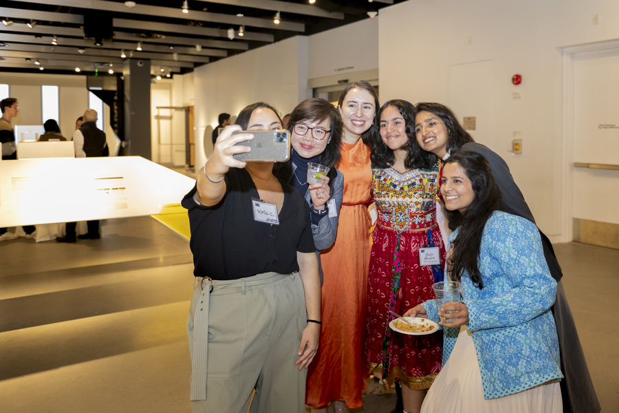 Six students pose for a selfie.