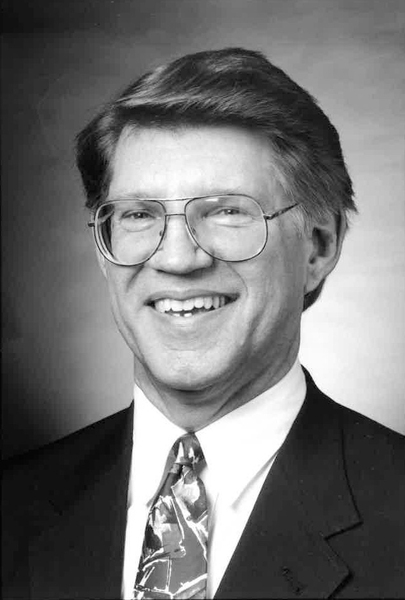 A black-and-white portrait of Professor John Vander Sande in middle age