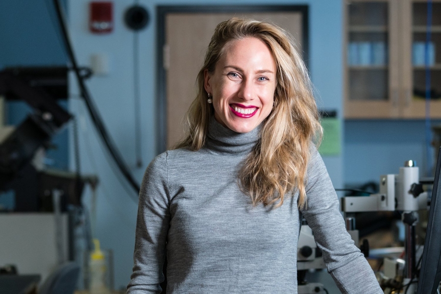 Polina Anikeeva stands in lab