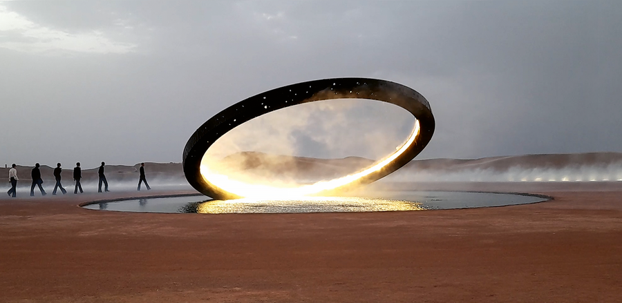 Glowing white disk with models walking around it in the desert