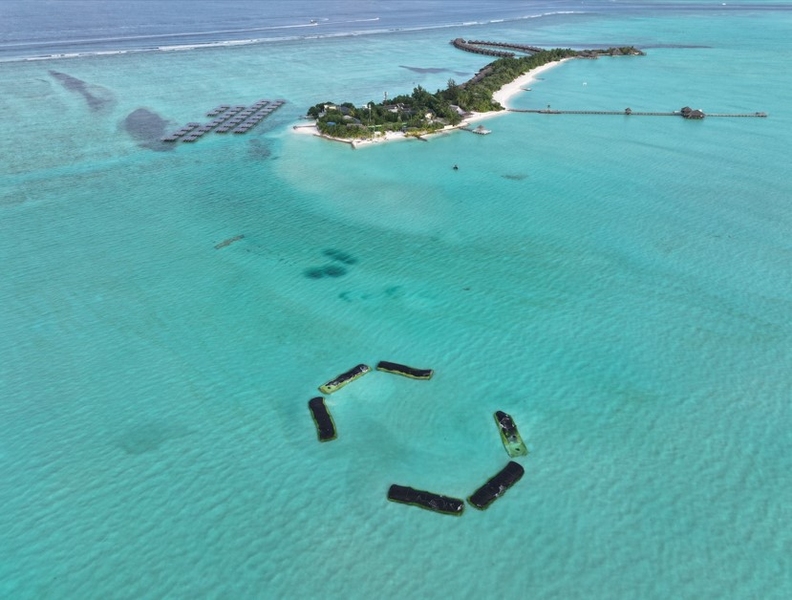 Aerial view of underwater structures in the ocean seen from afar