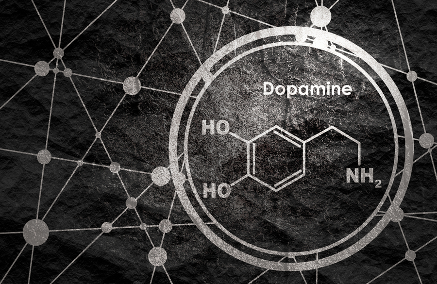 Skeletal formula of dopamine molecule on a black background