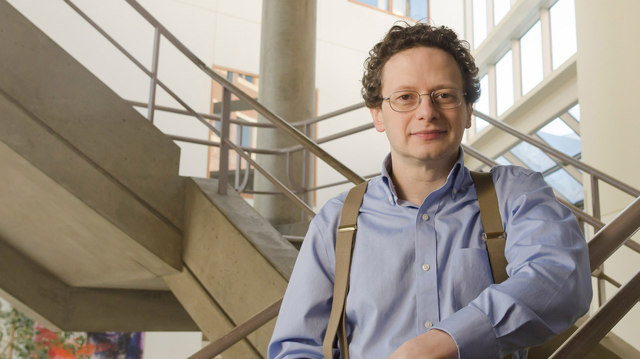Stuart Levine poses on a stairwell