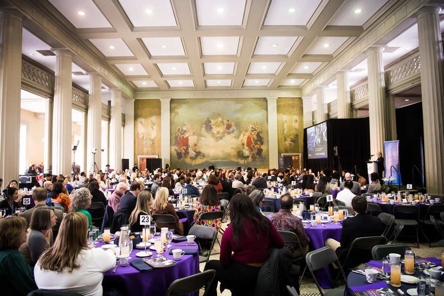 A large group gathered in Walker Memorial Hall at MIT