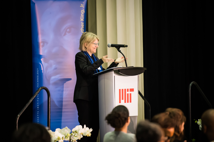 MIT President Sally Kornbluth speaks at podium