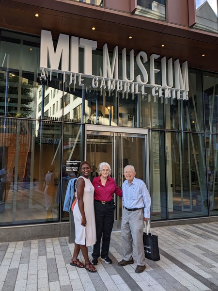 Cyrianne Keutcha, Dabney White Dixon, and Fred Greene pose in front of the MIT Museum.