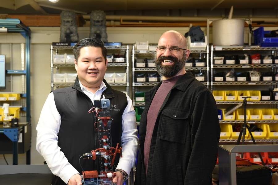 Russel Bradley and Brian Anthony stand together in the FrED factory at MIT.