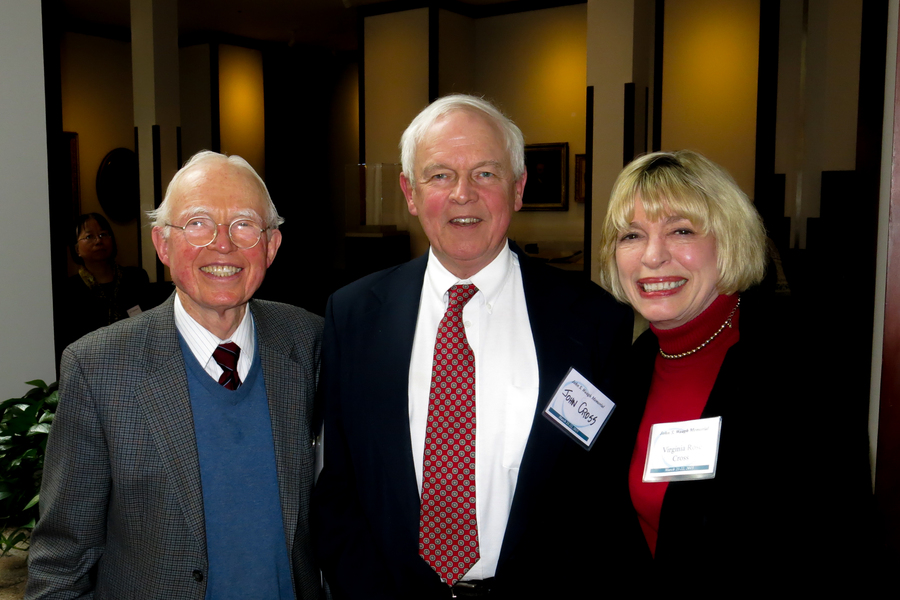 Fred Greene, John Cross, and Virginia Cross pose for a photo indoors