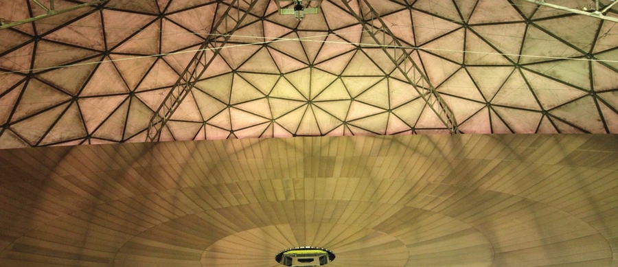 The 120-foot-diameter antenna of the Haystack Ultrawideband Satellite Imaging Radar (HUSIR) is shown enclosed in the radome housing.