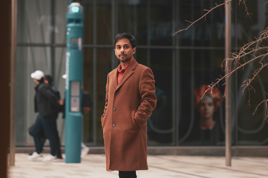 Dwai Banerjee stands outside near the MIT Museum
