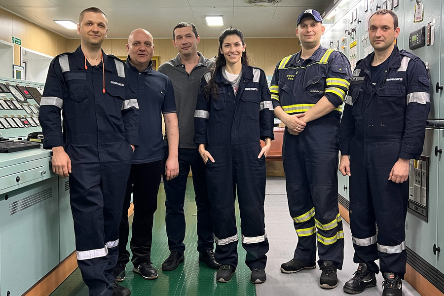 Group photo with six people, with Patricia Stathatou in center.