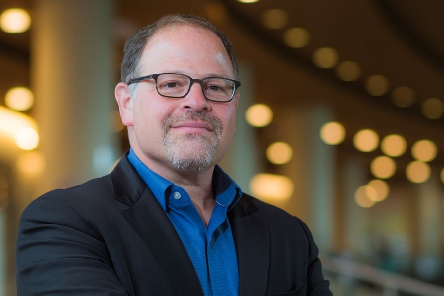 Portrait of Professor Adam Berinsky in blue shirt and jacket