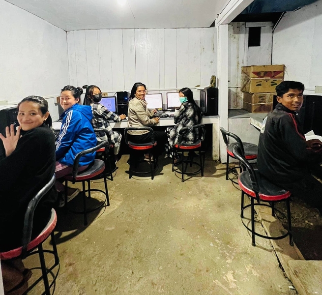 Six students sitting at computers