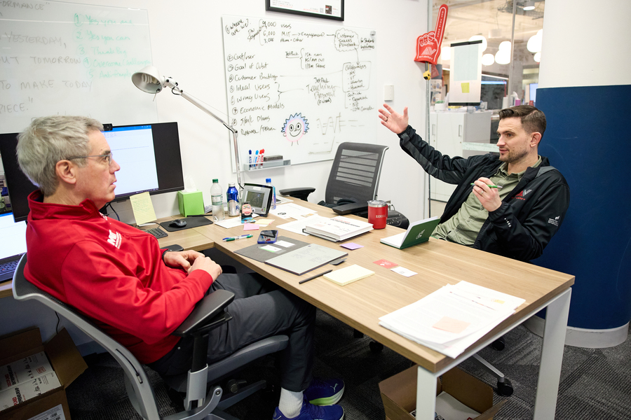 David Brown and Bill Aulet converse in Aulet’s office