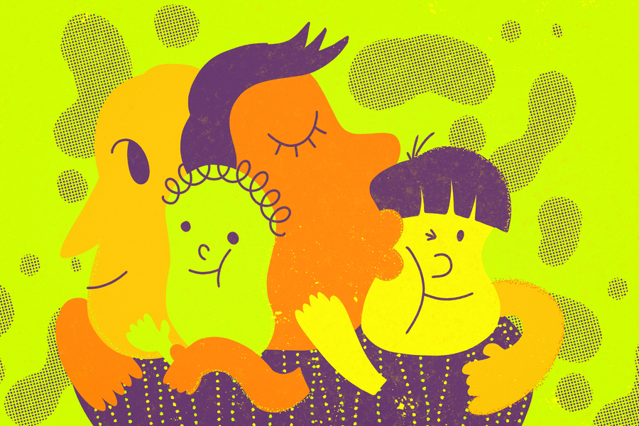 A colorful family has a group hug.