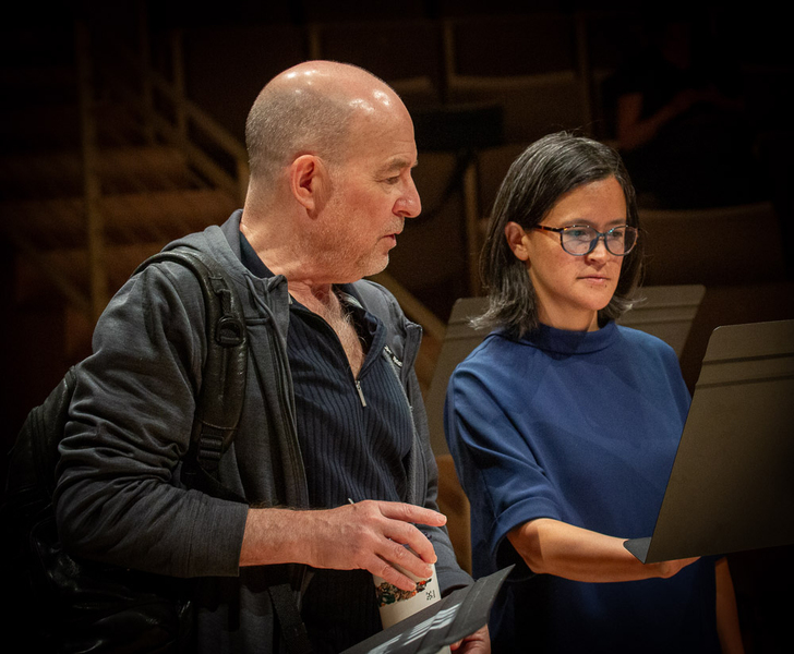 Evan Ziporyn and Megumi Stohs Lewi look at the same music stand