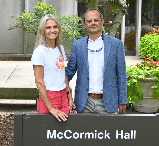 Flavia Cardarelli and Raul Radovitzky pose in front McCormick Hall