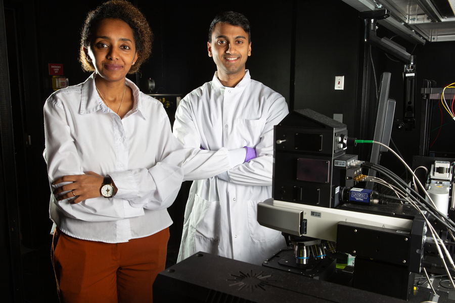 Loza Tadesse and Aditya Garg in lab.
